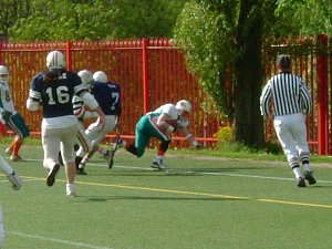 David Nimmins comes down inbounds with the ball for the final score