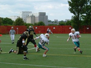 John Harrison gets yardage, blocking courtesy of Mikey Rumney