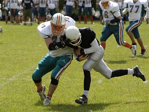 Adam Mennim gets the ball carrier